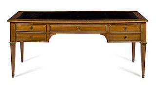 A Directoire Style Gilt Bronze Mounted Mahogany Bureau Plat Height 30 1/4 x width 71 1/4 x depth 31 3/4 inches.