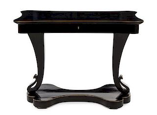 A Biedermeier Ebonized Fruitwood Writing Table Height 30 3/4 x width 43 3/4 x depth 26 1/2 inches.