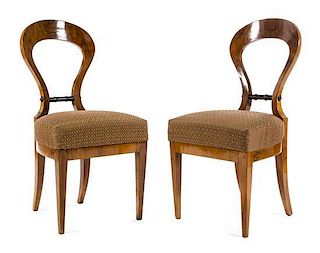 A Pair of Biedermeier Parcel Ebonized Burlwood Side Chairs Height 36 1/8 inches.