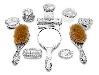 An Assembled American Art Nouveau Silver and Silver Mounted Dressing Set Length of first overall 11 inches.