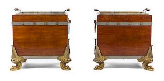 A Pair of Regency Steel and Gilt Bronze Mounted Mahogany Jardinieres Height 24 1/2 x width 27 x depth 21 inches.