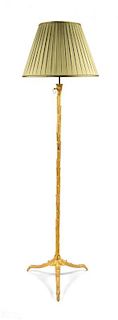 A Contemporary Gilt Metal Floor Lamp Height overall 60 1/4 inches.
