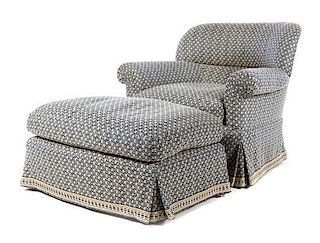 A Contemporary Upholstered Armchair and Ottoman Height of chair 33 3/4 inches.