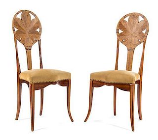 A Pair of French Art Nouveau Fruitwood Side Chairs Height 40 1/4 inches.