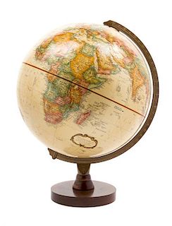 A Vintage Replogle World Globe Height overall 16 inches.