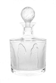 A Lalique Molded and Frosted Glass Bottle Height 9 3/4 inches.