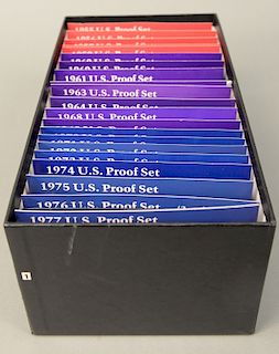 U.S. proof sets in black box (1954-1977).