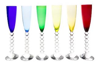 A Set of Six Baccarat Glass Champagne Flutes Height 11 3/8 inches.