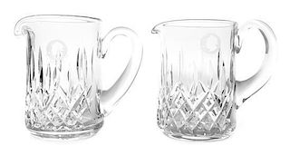 Two Waterford Cut Glass Pitchers Height 6 1/2 inches.