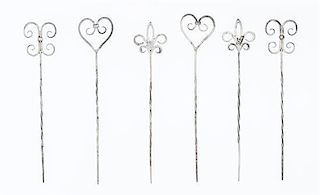 A Set of Six Silver Appetizer Picks Average length 7 7/8 inches.