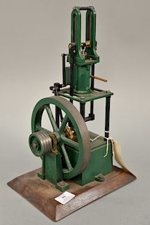 Vertical steam engine green black painted cast iron 7" flywheel, 2" stroke on wood base, ht. 16 in., base 9 3/4" x 7"