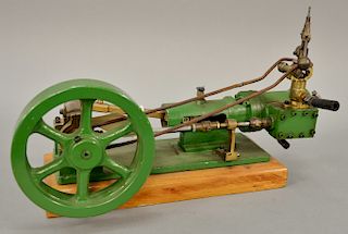 Horizontal steam engine, belt driven Governor, green cast iron with brass fittings, 7" dia. flywheel, 3" stroke.