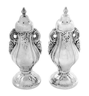 A Pair of Silver-Plate Casters Height 5 inches.