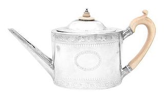 A George III Silver Teapot Width over handle 11 inches.