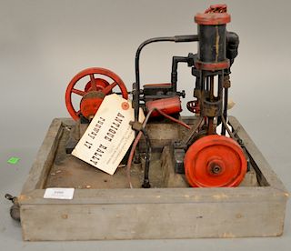 Two engines mounted on wood base vertical single cylinder along with two cylinder horizontal. ht. 7'' - 10''