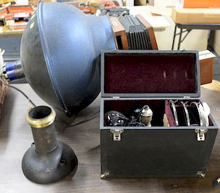 Group to include Eastman view camera no. 33A, Eastman Kodak, Elwood pattern camera baffle, and lenses.