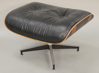 Eames chair ottoman, leather and rosewood.