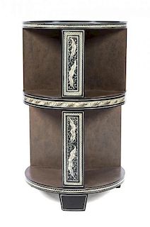 A Contemporary Faux Painted Bookstand Height 32 3/4 x diameter 19 3/4 inches.