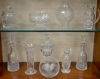 Eleven piece Waterford lot to include: covered compote, pair of decanters, covered jar, two vases, bowl, pitcher, mustard jar, cryst...