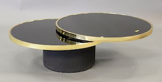 Institute of America brass and smoked glass swivel cocktail table with black base (similar to Gabriella Crespi Elisse). ht. 14in. di...