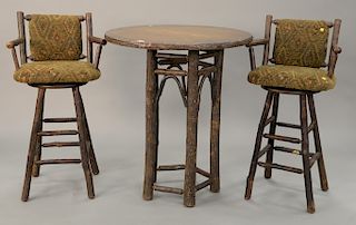 Old Hickory Shelbyville In. high top table and two swivel stools. ht. 42 in., dia. 37 in.