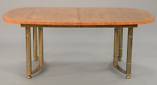 Harvey Probber burl top table with banded inlay, brass legs, and two 20 inch leaves. ht. 29 1/2 in., top: 45" x 72", opens to 112 in.