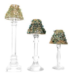 A Group of Three Cut Glass Candle Sticks Height of tallest overall 16 1/4 inches.
