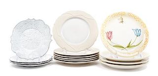 A Collection of Twenty Ceramic Plates and Saucers Diameter of widest 8 1/2 inches.