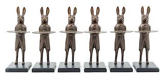 A Set of Six Figural Placecard Holders Height overall 11 3/8 inches.