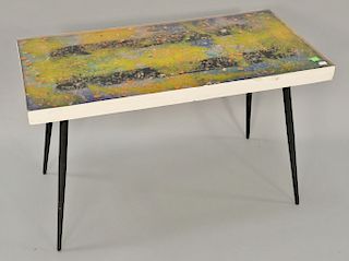 French modern resin table on wrought iron tapered legs. ht. 19 1/2 in., top: 31 1/2'' x 16''