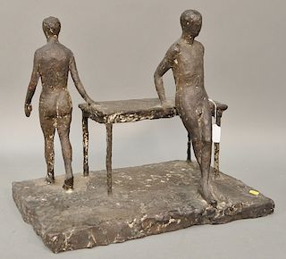 Figural bronze sculpture having two figures and a table. ht. 17 in., wd. 20 in.