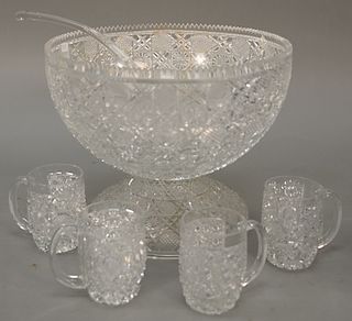 Group of cut glass to include a punch bowl with twelve cups and two large bowls. punch bowl: ht. 10 1/2 in., dia. 13 in.