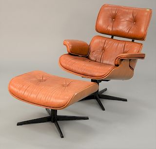 Charles Eames style leather lounge chair.