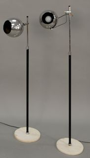Pair of Italian modern floor lamps with chrome globular shade on marble bases (ht. 48 in.). Provenance: Estate of Kenneth Jay Lane