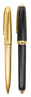 Two Cartier Ballpoint Pens Length of first 5 5/8 inches.