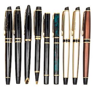A Collection of Eight Waterman Ballpoint Pens Average length 5 1/2 inches.
