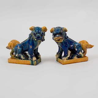 Pair of Chinese Sancai Glazed Pottery Figures of Buddhistic Lions