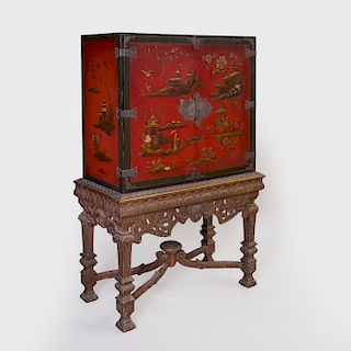 Metal-Mounted Red Lacquer and Parcel-Gilt Cabinet on a Continental Carved Wood Stand