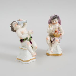 Contentinental Porcelain Figures of Putti Emblamatic of Winter and Autumn