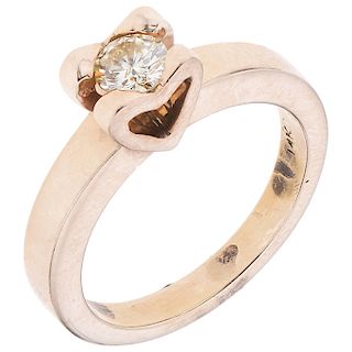 A diamond 14K rose gold solitaire ring.