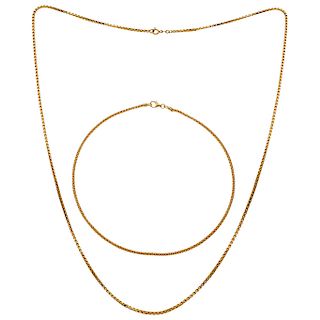A 18K yellow gold choker and necklace.