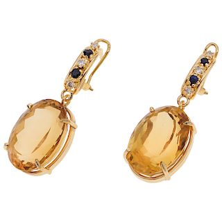 A citrine, sapphire and diamond 14K yellow gold pair of earrings.