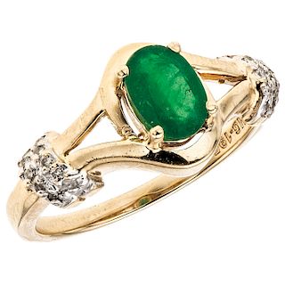 An emerald and diamonds 14K yellow gold ring.