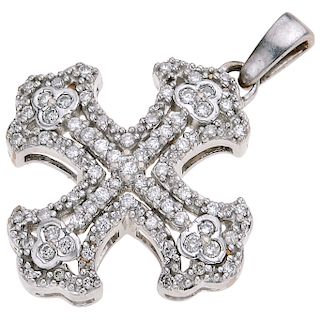 A diamond 14K white gold cross pendant.