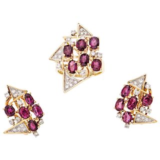 A ruby and diamond 14K yellow gold ring and pair of earrings set.