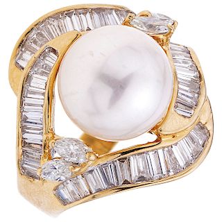A cultured pearl and diamond 18K yellow gold ring.