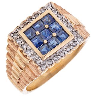 A sapphire and diamond 14K yellow gold ring.