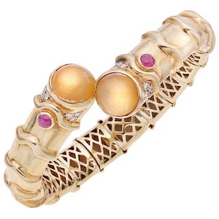 A quartz, ruby and diamond 14K yellow gold cuff bracelet.