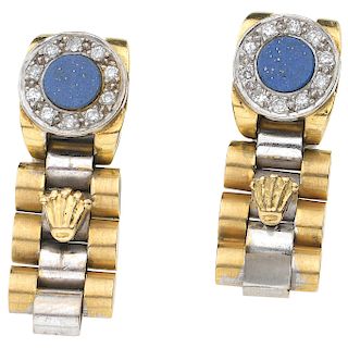 A lapis lazuli and diamond 18K yellow and white gold, and palladium silver pair of earrings.