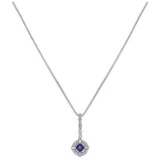 A sapphire and diamond 18K and 14K white gold necklace and pendant.